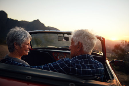 Going on a good old road trip. a senior couple enjoying a road trip.の写真素材