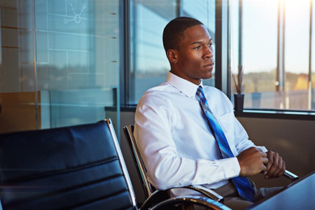 Dreaming made me who I am today. a businessman sitting thoughtfully in his office.の写真素材