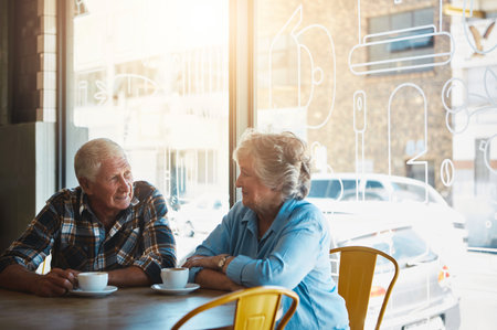 We are friends as well as lovers. a senior couple out on a date at a coffee shop.の写真素材