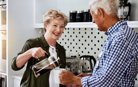 Made just the way you like it. a senior couple drinking coffee together at home.の写真素材
