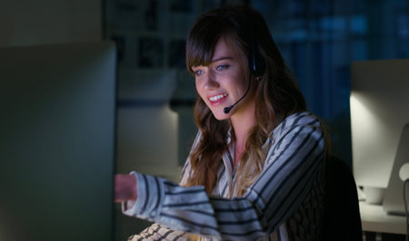 Let me look that up for you. an attractive young businesswoman sitting in her office and wearing a...