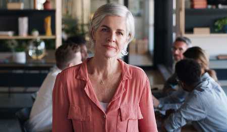 Shes a stand out success. Portrait of a confident mature businesswoman in in the office boardroom...