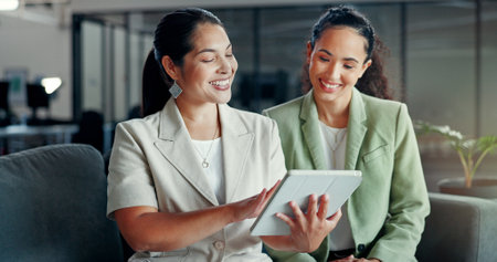 Tablet, business lounge collaboration or women review financial portfolio, stock market feedback or investment. Finance economy, forex account management team or trader trading NFT, bitcoin or cryptoの写真素材