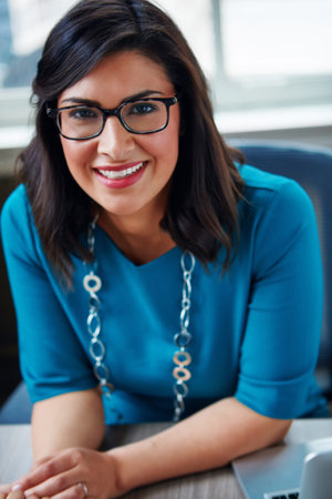 Ive always had my sights set on success. Portrait of a businesswoman working at her desk in an...