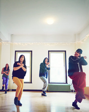 Hip hop - Not something you do, something you are. a group of young people dancing together in a...