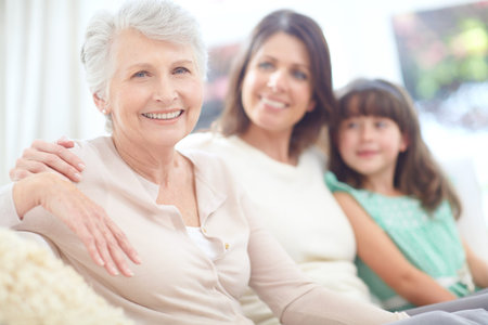 Family is everything. Portrait of an elderly woman spending time with her daughter and granddaughter...