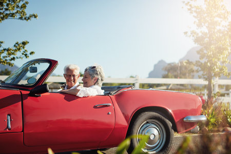 Stay busy and engaged with life. a senior couple going on a road trip.の写真素材