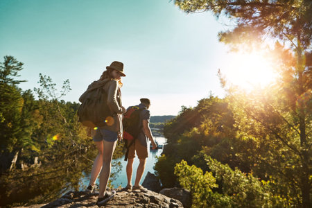 Find what takes your breath away. a young couple out on an adventurous date in the mountains.の写真素材