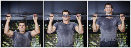 Set your own goals. Composite series of a man doing chin ups in a gym.