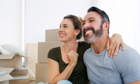 We have so many ideas. a middle aged couple moving into their new home.の写真素材