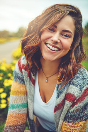 Spring is here and I feel wonderful. Portrait of an attractive young woman enjoying a spring day...