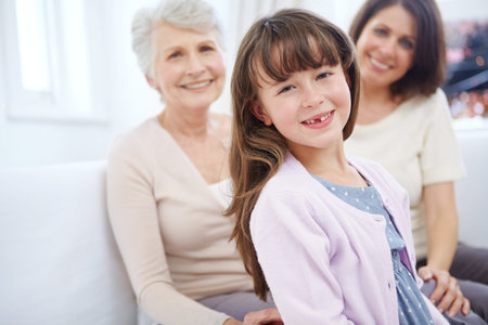 Family is like a glimpse of heaven. Portrait of an adorable little girl with her mother and...