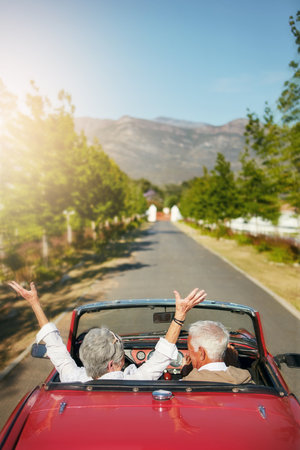 To live is to travel. a senior couple going on a road trip.の写真素材