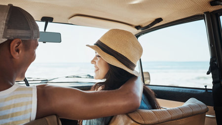 Taking a little break for themselves. a young couple enjoying a road trip along the coast.の写真素材