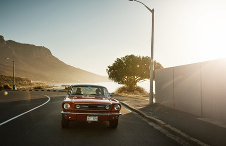 Freedom lies on the open road. a young couple enjoying a road trip together.