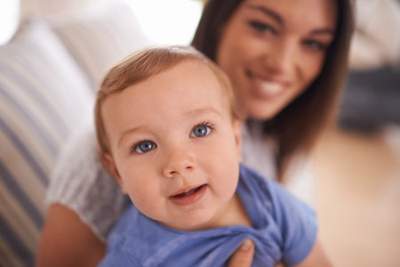 She takes after her mom. An adorable little girl with her mother.