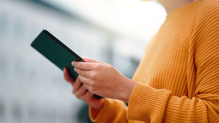 Tablet, outdoor city and woman hands typing for application management, fast networking or business...