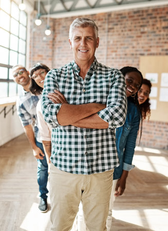 At the forefront of creative excellence. Portrait of a group of creative businesspeople standing...