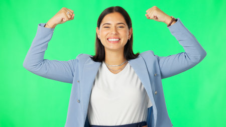 Business woman, strong muscles and green screen with smile on face for success, celebration and motivation. Businesswoman, bicep arms and mock up portrait for corporate goals by studio backgroundの写真素材