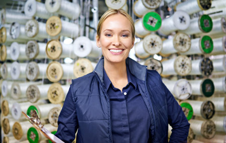 If you need it, we have it. Portrait of an attractive young female worker in a warehouse.の写真素材