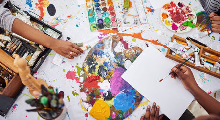 Pick a color and start creating. a group of people attending a art class.