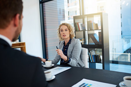 Ive got an assignment for you. corporate businesspeople working in the boardroom.の写真素材