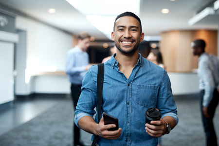 This years conference couldnt have gone any better. Portrait of a young businessman attending a conference.の写真素材