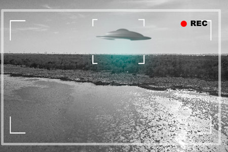 UFO, alien and camera viewfinder with a spaceship flying in the gray sky over area 51 for an...