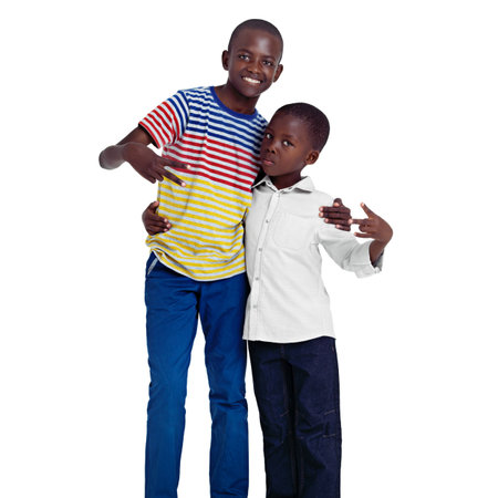 No sibling rivalry here. Studio shot of two african siblings against a white background.の写真素材