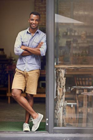 Coffee shop, black man and portrait of small business owner at door to welcome. Entrepreneur person...