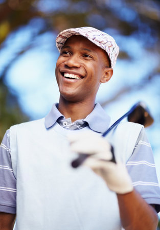Sports, smile and happy with black man on golf course for training, competition and game. Happiness, fitness and relax with male golfer and club in outdoors for golfing, summer and workout practiceの写真素材