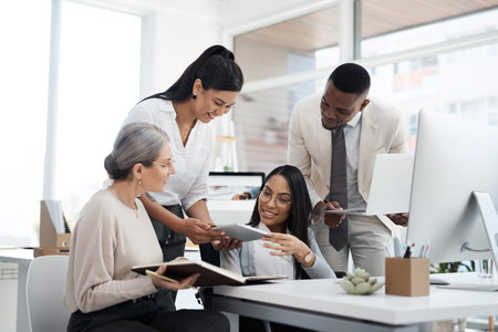 Theyve all got their own ideas. a group of diverse businesspeople having an informal meeting in their office.の写真素材