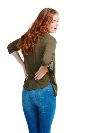 What can I take for this. Studio shot of a young woman experiencing back pain.