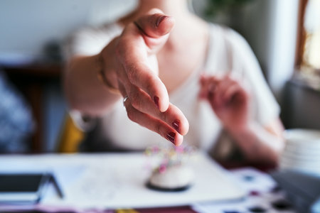 Its always a pleasure. an unrecognizable businesswoman reaching out for a handshake.の写真素材