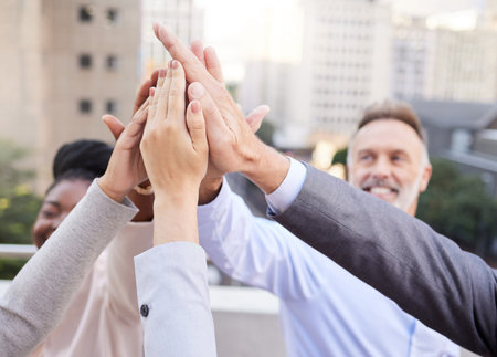 This team is capable of anything. a diverse group of businesspeople huddled outside together with...