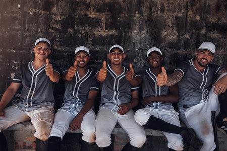Whatever the question, the answer is baseball. a group of young baseball players sitting in the...