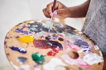 You have the potential to create beautiful things. an unrecognizable woman holding a painters...