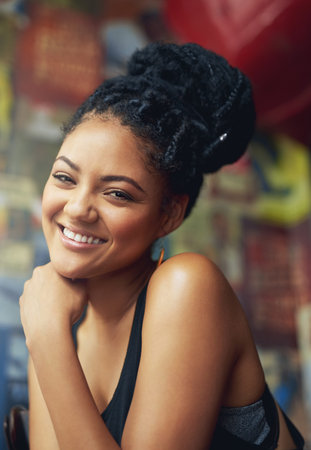 Her happiness is evident for all to see. Cropped portrait of an attractive young woman.