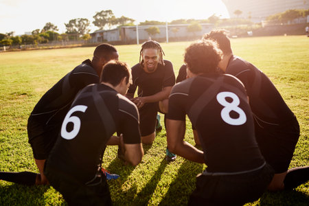 Weve got the best game plan. a diverse group of sportsmen crouching together before playing rugby during the day.の写真素材