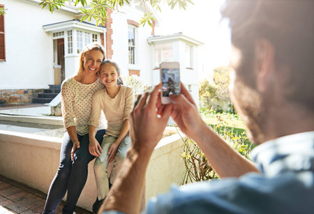 Family photography, house and camera phone photo of kid, mother or people with father taking...