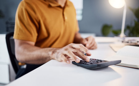 Calculator, finance and business man hands for financial budget, profit check or accounting in...