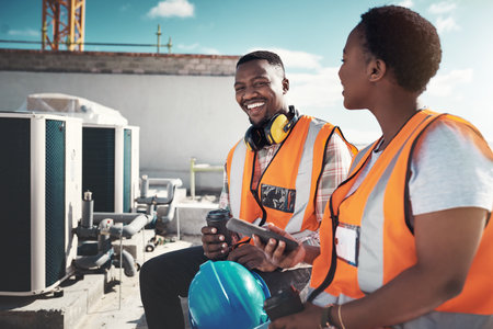 Portrait, engineer team and people on coffee break at construction site. Smile, architects and black man and woman relax with tea, talk and conversation after building project, working or engineeringの写真素材