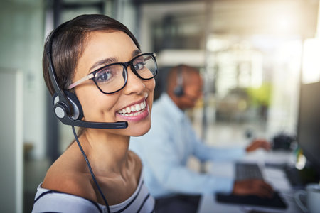 Call center, customer service and portrait of woman with smile for consulting, help and advice. Telemarketing, communication and female consultant for contact, crm support and networking in officeの写真素材