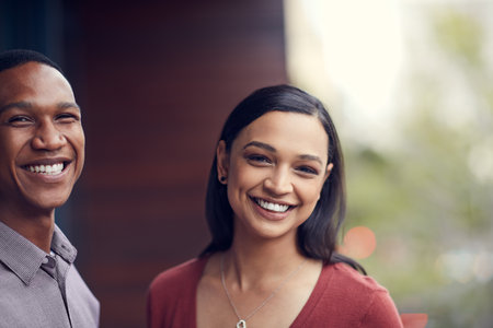 Find someone whos smile matches yours. Portrait of a happy young couple spending time together.の写真素材
