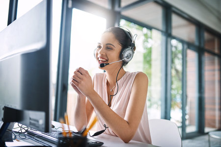 Happy woman, call center and consulting on computer for customer service, support or telemarketing...