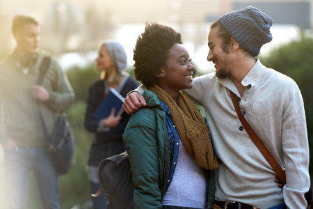 Ill meet you after class. an affectionate young couple on campus.