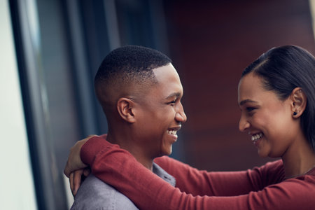 Love each other, a lot. a happy young couple sharing a romantic moment together.
