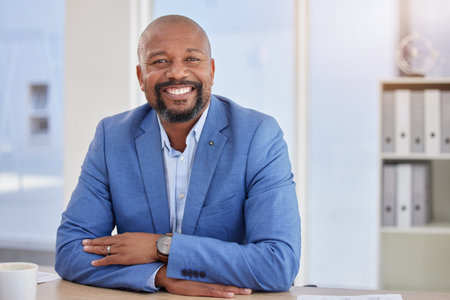 Happy black man, mature or portrait in finance office about us, company profile picture or CEO introduction. Smile, corporate or management person with business investment, savings or financial ideasの写真素材