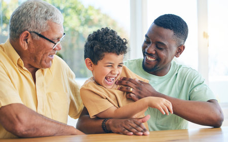 Black family grandfather, child and father playing, having fun and enjoy time together in Angola...