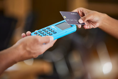 Hands, credit card and machine for ecommerce, payment or wireless transaction and purchase at retail...